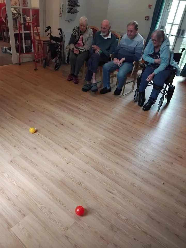 Several people play boule together