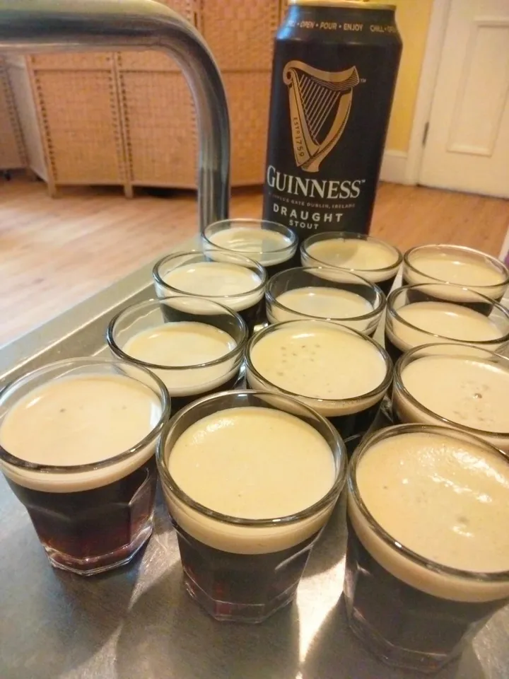 Trolley holding several glasses of Guinness
